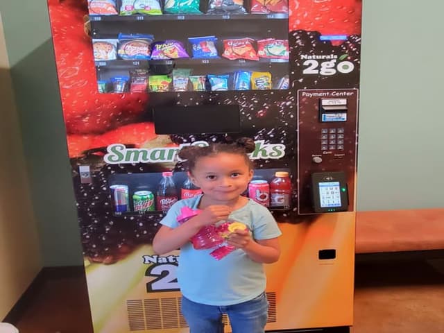 Semaya, Tuni's daughter and Chief Taste Tester at Wellness Vending Solutions in San Diego