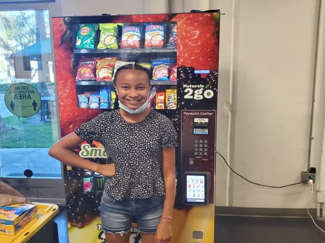 Sophia, Tuni's daughter and Snack Quality Inspector at Wellness Vending Solutions in San Diego